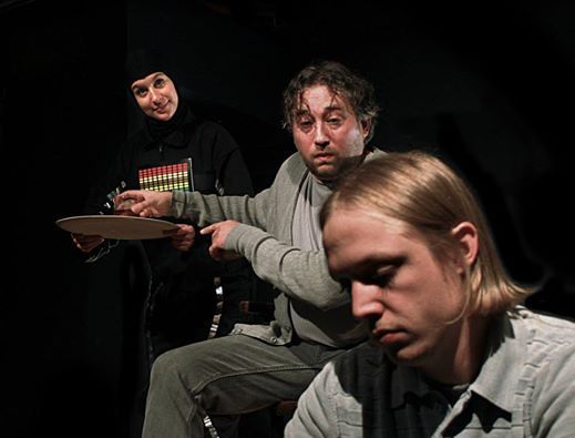 Robot (Erin Singleton) watches over Man (Brian Witcowicz) and Boy (Trent Stephenson)