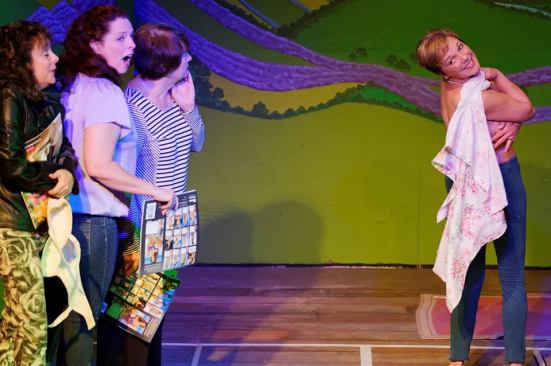 Chris (Dena Dunn) shows off the bare reality