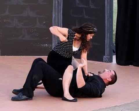 Kate () responds to Petruchio's  wooing (Andrew Aguilar) 