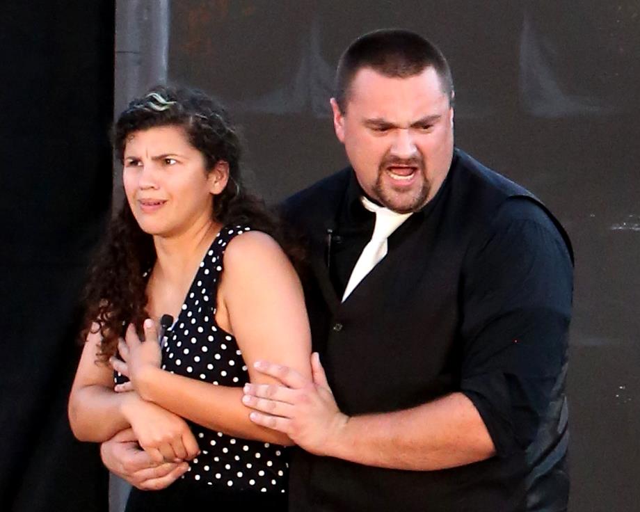 An amorous chat in THE TAMING OF THE SHREW. KATE () AND PETRUCHIO (Andrew Aguilar)